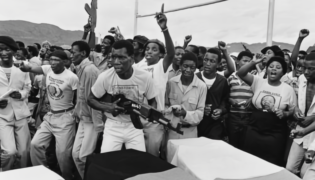 Armed_protest_Image_Gideon_Mendel_Wikimedia_Commons