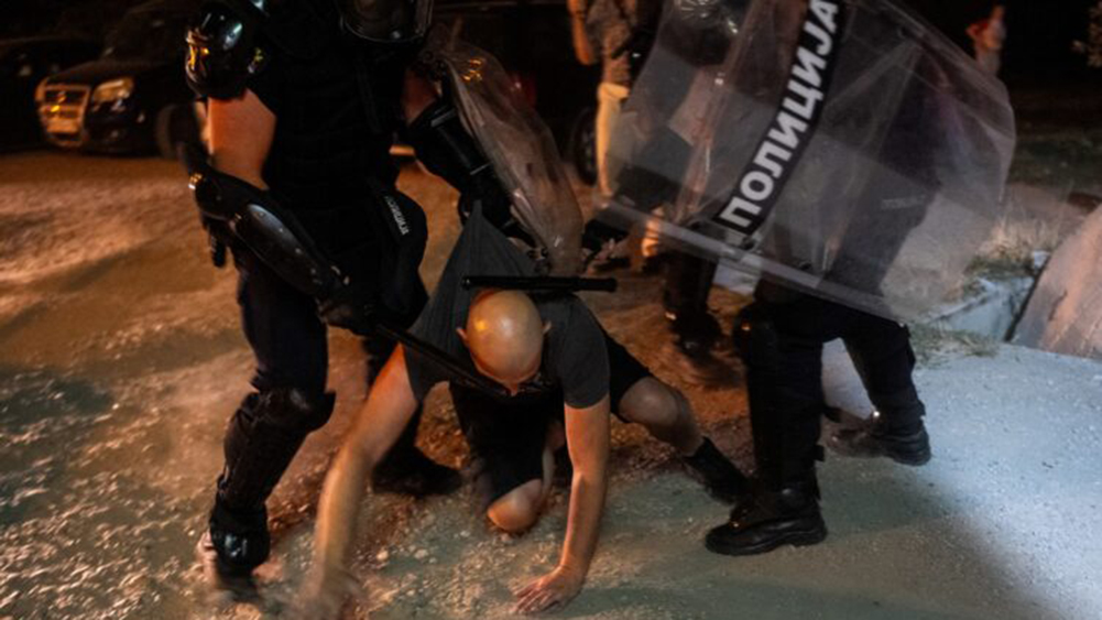 Police units clash with anti-government protesters in the Serbian city of Novi Sad on September 5, 2025, after several thousand rallied seeking early elections. Police late on September 5 used tear gas and stun grenades to disperse anti-government protesters in the Serbian city of Novi Sad after several thousands of them rallied seeking early elections. The demonstration was another in a series of student-led protests held across the Balkan country after a fatal collapse of the Novi Sad train station roof last November. The tragedy, which killed 16 people, was widely blamed on entrenched corruption with protesters' demands for a transparent investigation growing into calls for snap elections. The demonstrations, that piled pressure on President Aleksandar Vucic, mainly passed off peacefully. But in mid-August they degenerated into violence from what protesters said was heavy-handed tactics by government loyalists and police.,Image: 1034486409, License: Rights-managed, Restrictions: , Model Release: no, Credit line: Uros Arsic / AFP / Profimedia